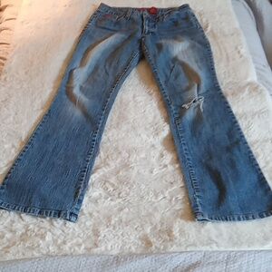 Women's size 7 South Pole distressed jeans. GUC except for hole in one knee.